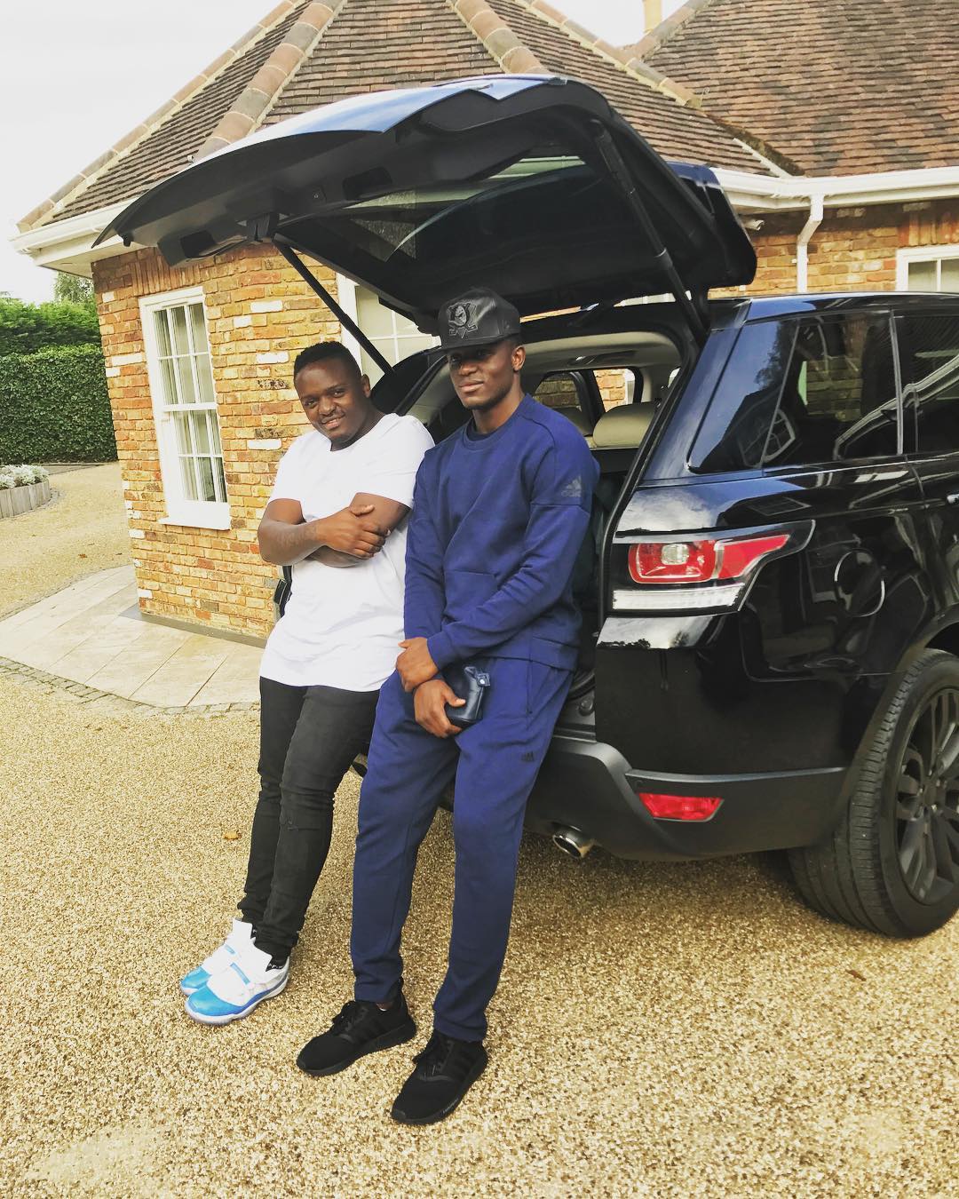 2018-07-26-Victor Wanyama And McDonald Mariga: Chilling On The Rear End Of Their Range Rover Car